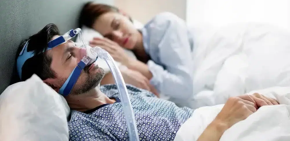 osa patient sleeping with cpap